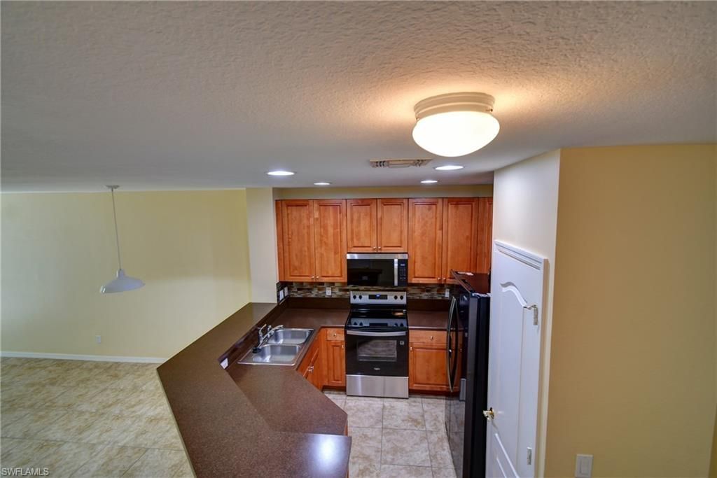8585 Athena Ct , Lehigh Acres, FL 33971 Photo