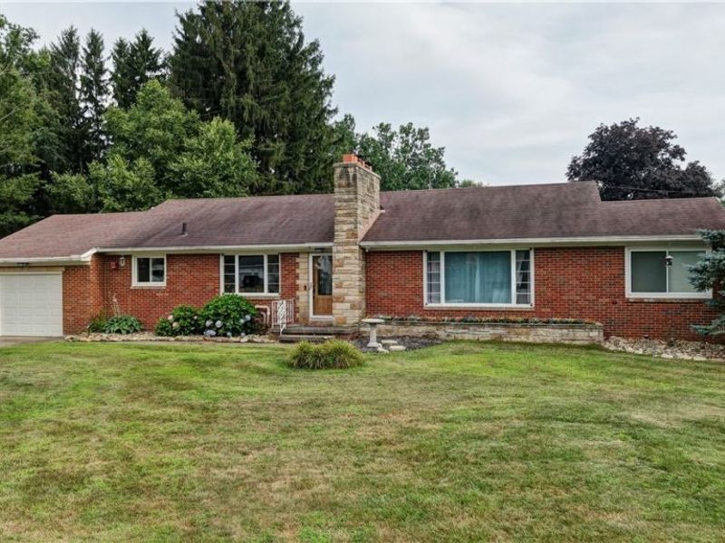 3122 Sweitzer Street NW, Uniontown, OH 44685 Photo 1