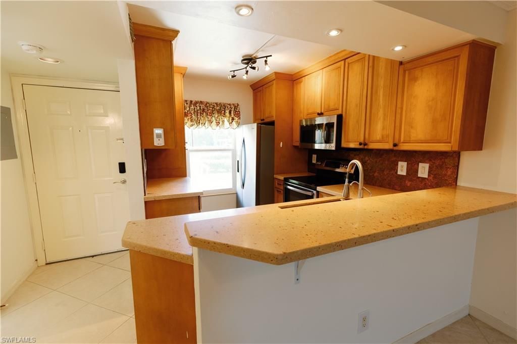1015 Mainsail Dr, Unit 103, Naples, FL 34114 Photo