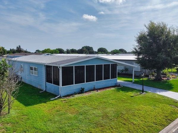 926 Frangi Pani Drive, Barefoot Bay, FL 32976