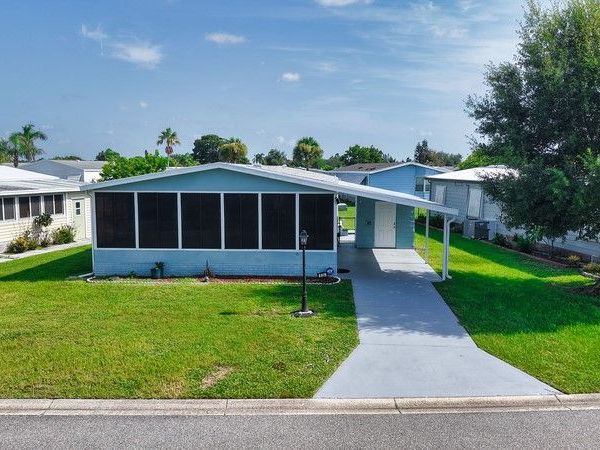 926 Frangi Pani Drive, Barefoot Bay, FL 32976