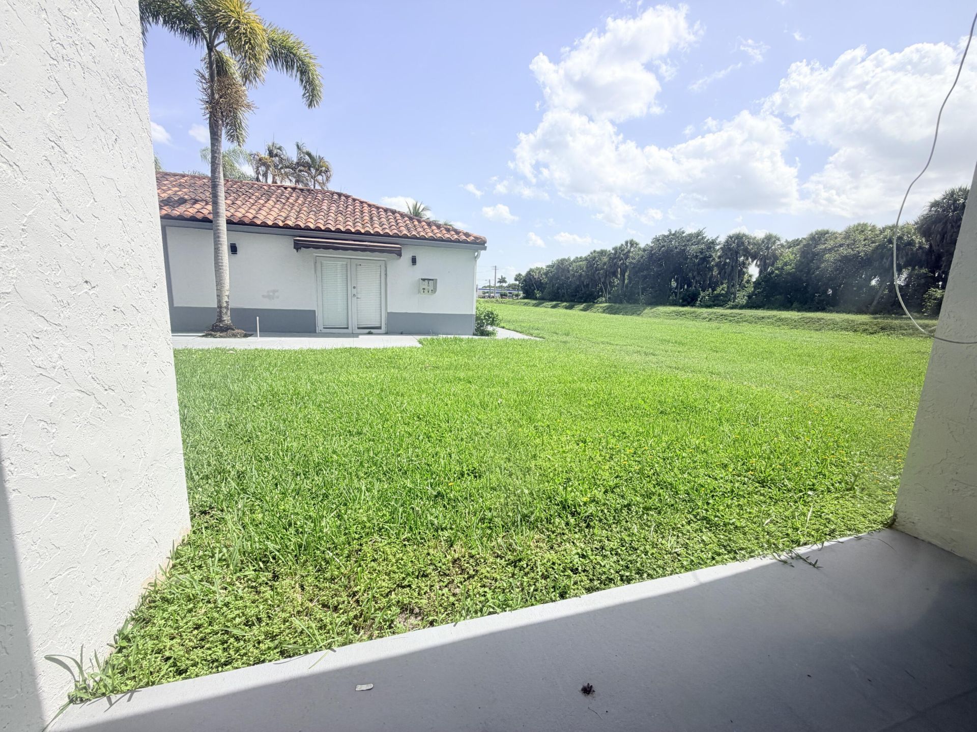 1089 N Benoist Farms Road, Unit 102, West Palm Beach, FL 33411 Photo