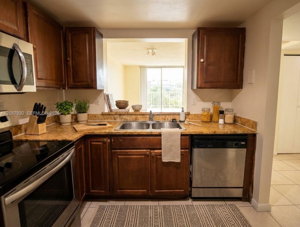 496 NW 165th St Rd , Unit D-409, Miami, FL 33169 Photo
