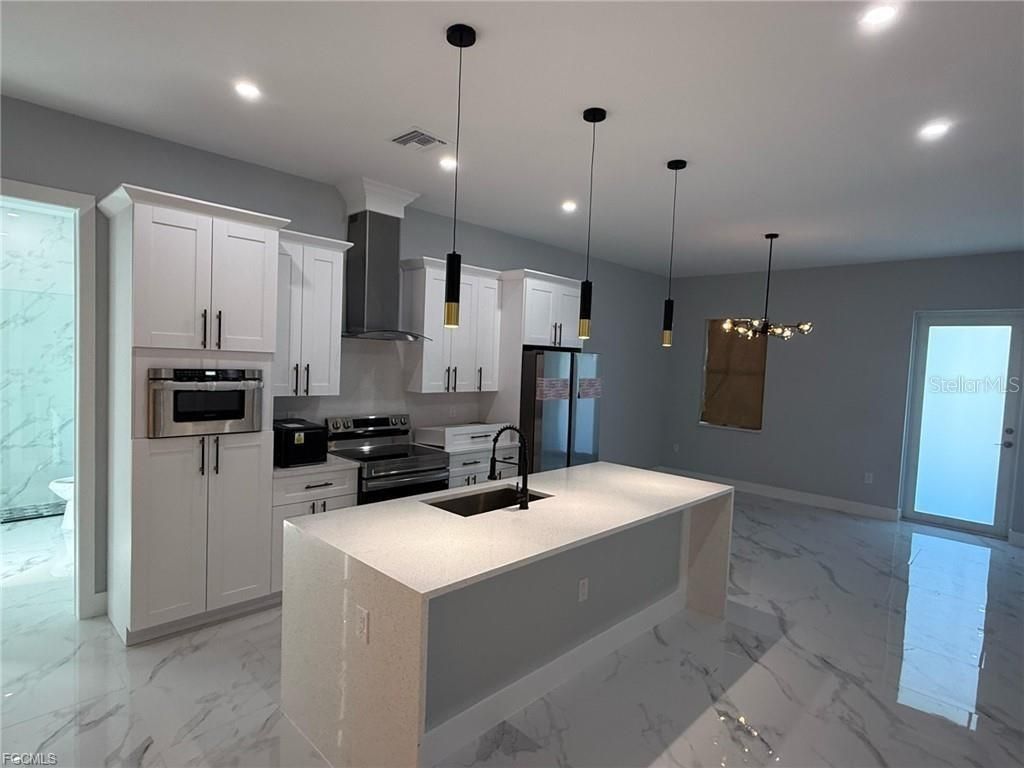 705 Ledge Street , Lehigh Acres, FL 33972 Photo