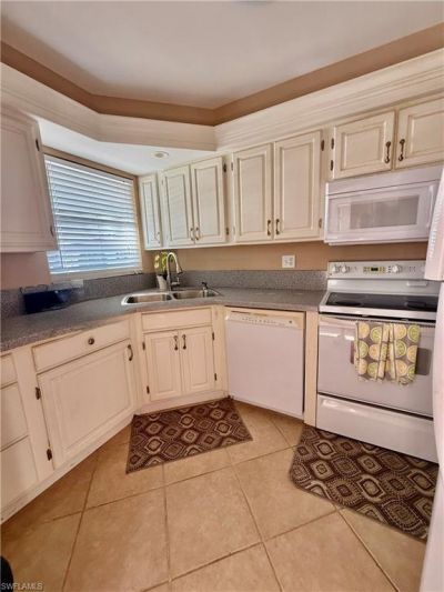 1 High Point Cir W, Unit 303, Naples, FL 34103 Photo