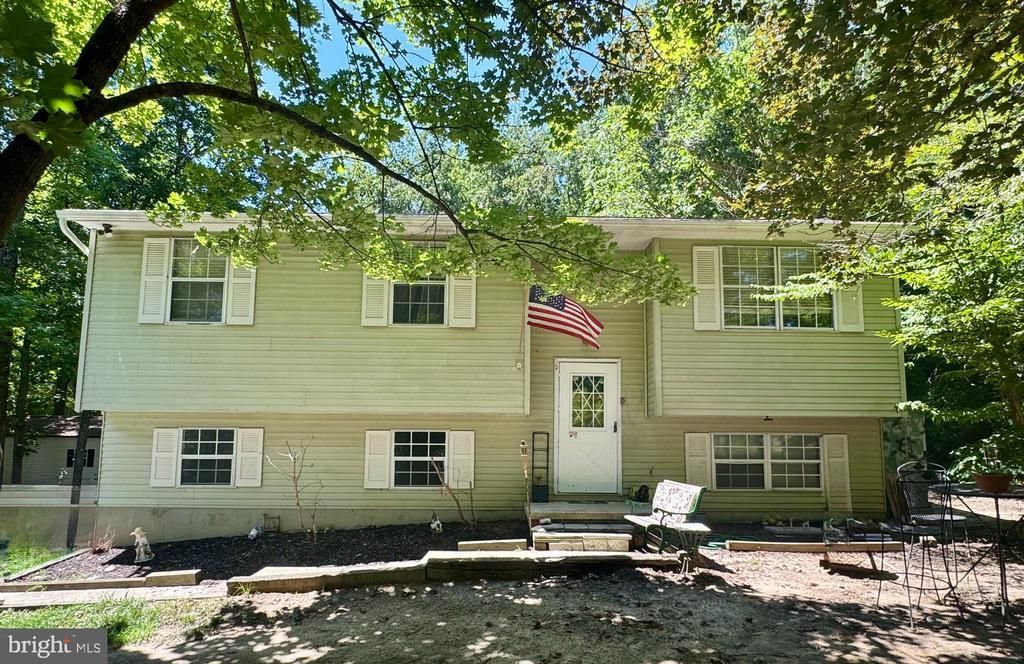 7910 MOUNT HARMONY LANE, OWINGS, MD 20736