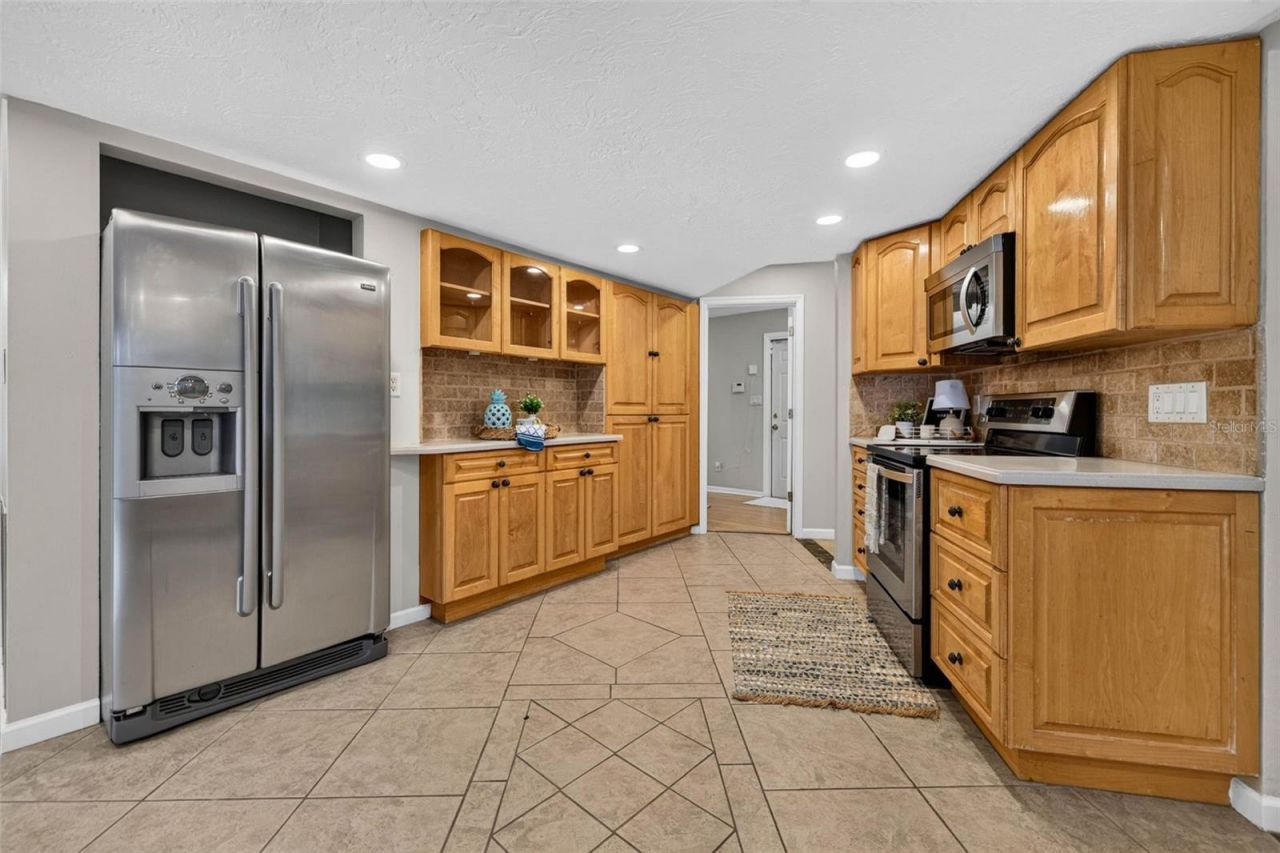 6390 Burning Tree Drive, Seminole, FL 33777 Photo