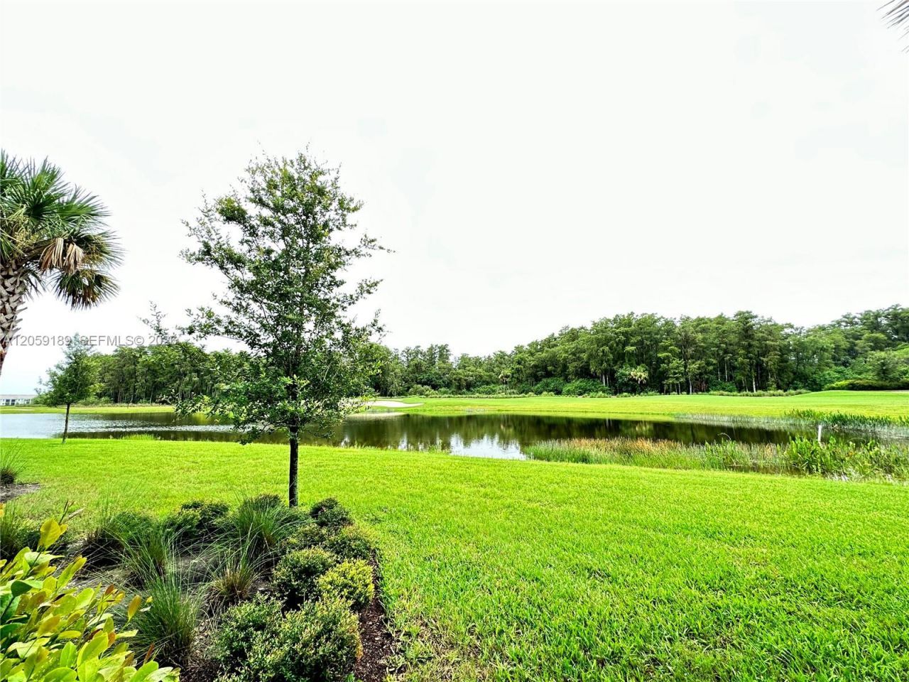 6070 National Blvd , Unit 215, Ave Maria, FL 34142 Photo