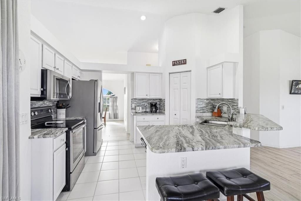 1702 SE 11th Ave, Cape Coral, FL 33990 Photo