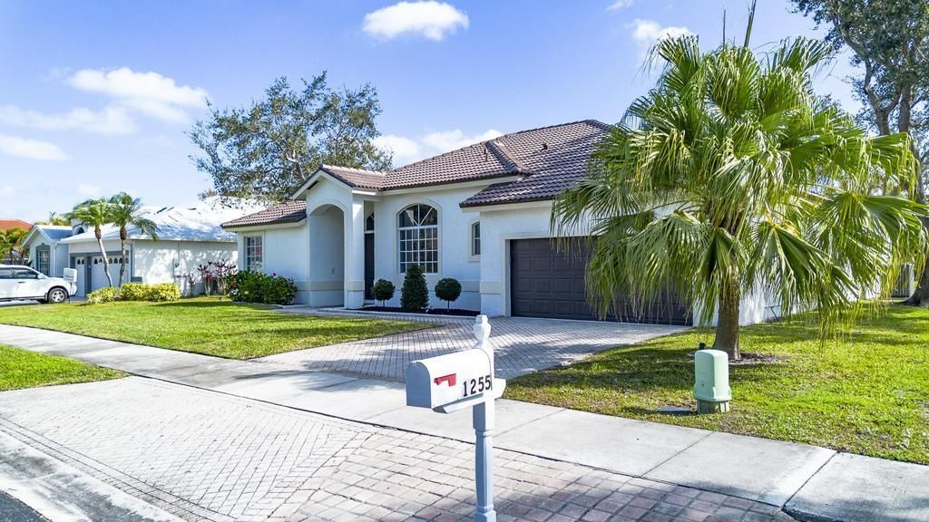 1255 SW Maplewood Drive, Port Saint Lucie, FL 34986 Photo
