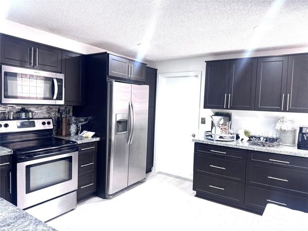 1543 Barcelona Way, Unit 5-30, Weston, FL 33327