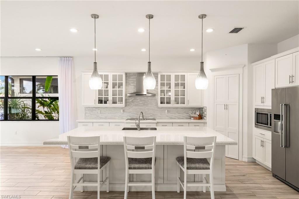 9344 Glenforest Dr , Naples, FL 34120 Photo