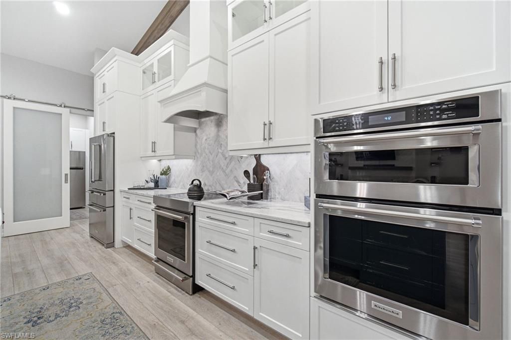 5737 Hidden Oaks Ln , Naples, FL 34119 Photo