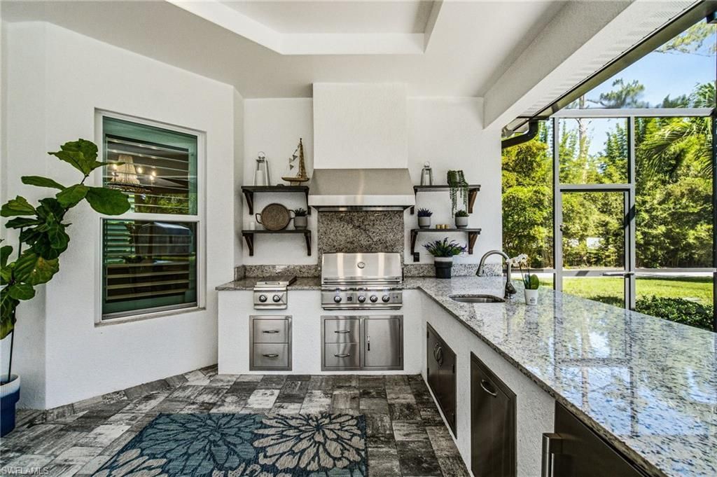 5737 Hidden Oaks Ln , Naples, FL 34119 Photo