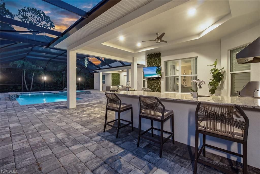 5737 Hidden Oaks Ln , Naples, FL 34119 Photo