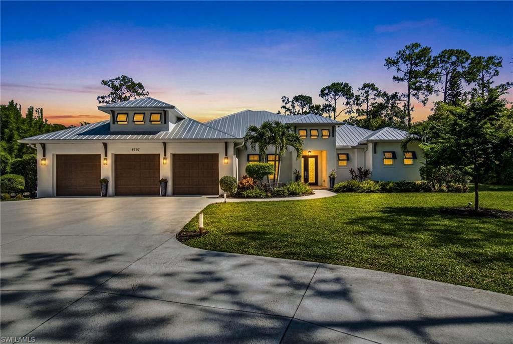 5737 Hidden Oaks Ln, Naples, FL 34119 Photo