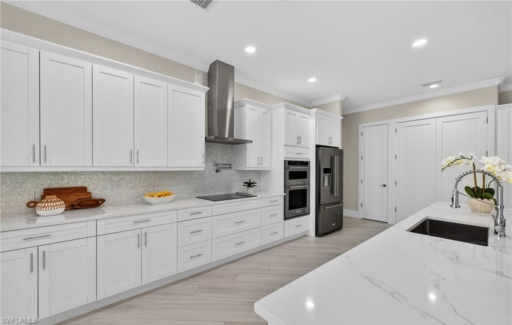 6461 Livingston Woods Ln, Naples, FL 34109 Photo