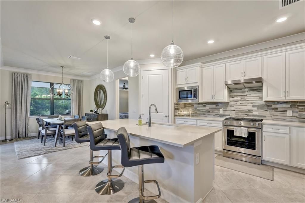 6820 Winding Cypress Dr, Naples, FL 34114 Photo