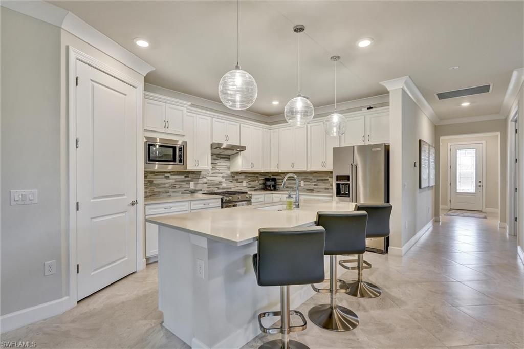 6820 Winding Cypress Dr, Naples, FL 34114 Photo