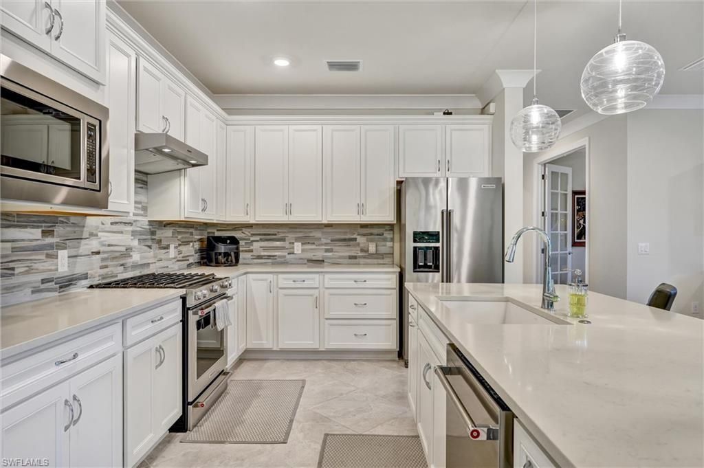 6820 Winding Cypress Dr, Naples, FL 34114 Photo