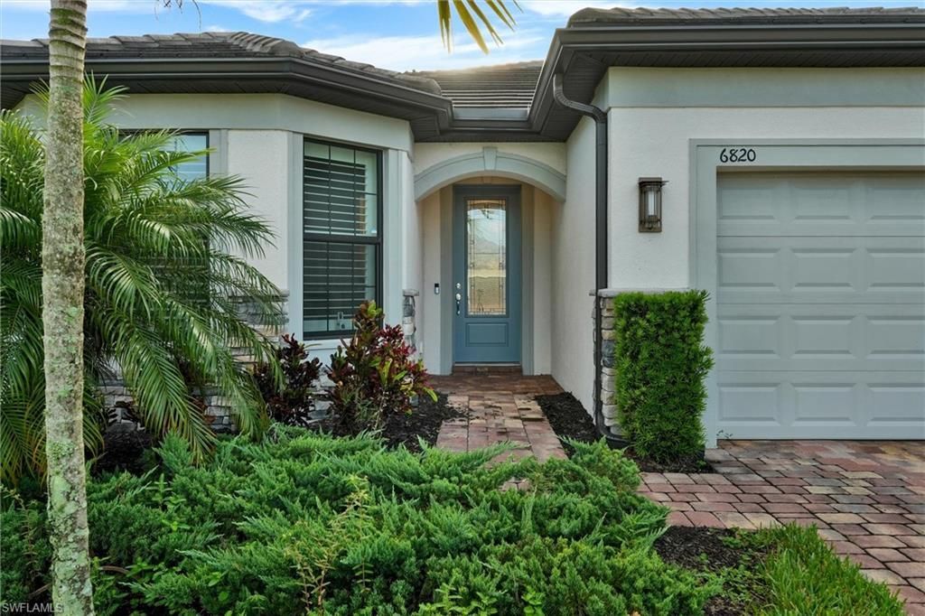 6820 Winding Cypress Dr, Naples, FL 34114 Photo