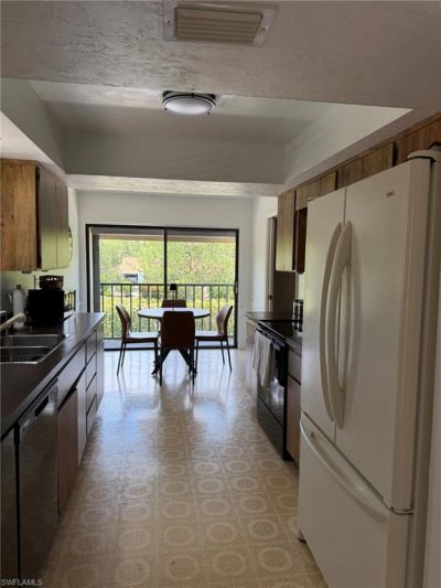 576 Retreat Dr, Unit 201, Naples, FL 34110 Photo