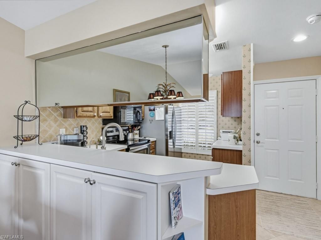 1045 Mainsail Dr, Unit 413, Naples, FL 34114 Photo