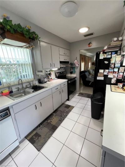 225 Lake Dr , Lehigh Acres, FL 33936 Photo