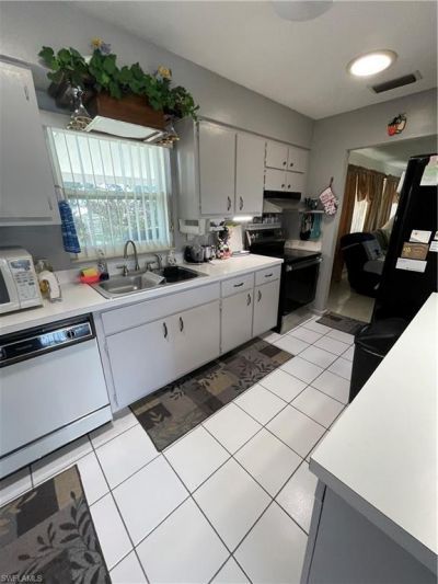 225 Lake Dr , Lehigh Acres, FL 33936 Photo