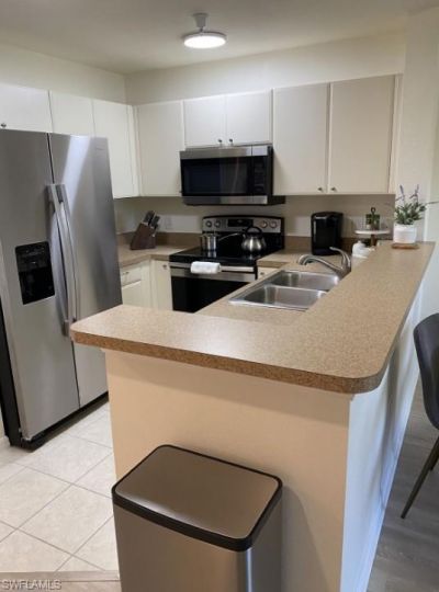 4430 Botanical Place Cir, Unit 303, Naples, FL 34112 Photo