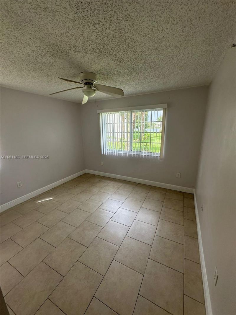 5005 Wiles Rd , Unit 102, Coconut Creek, FL 33073 Photo