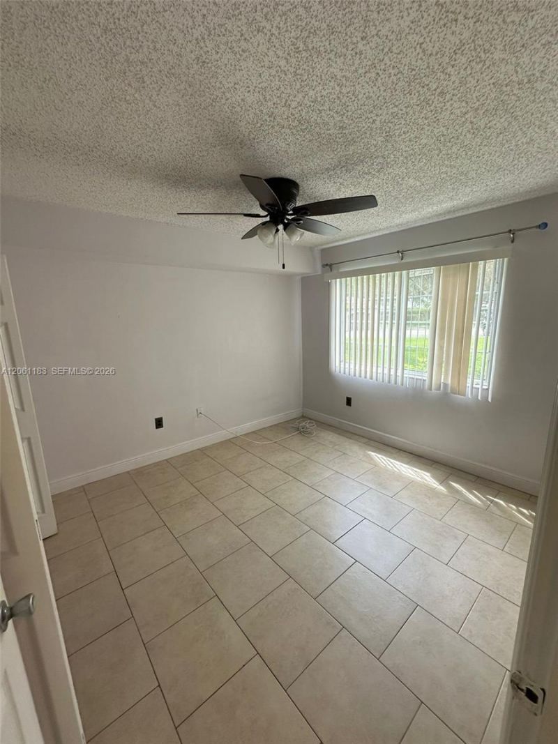 5005 Wiles Rd , Unit 102, Coconut Creek, FL 33073 Photo