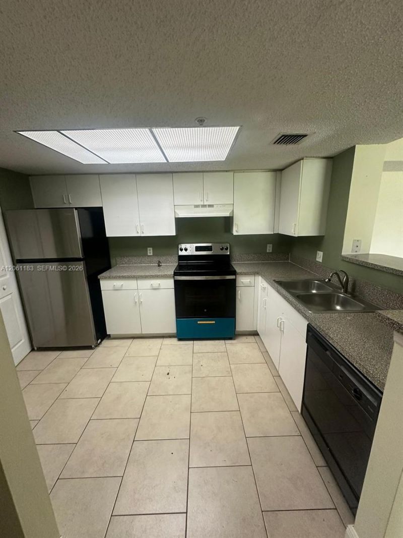 5005 Wiles Rd , Unit 102, Coconut Creek, FL 33073 Photo