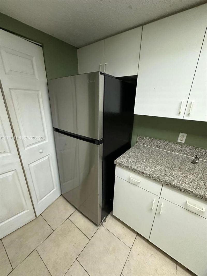 5005 Wiles Rd , Unit 102, Coconut Creek, FL 33073 Photo