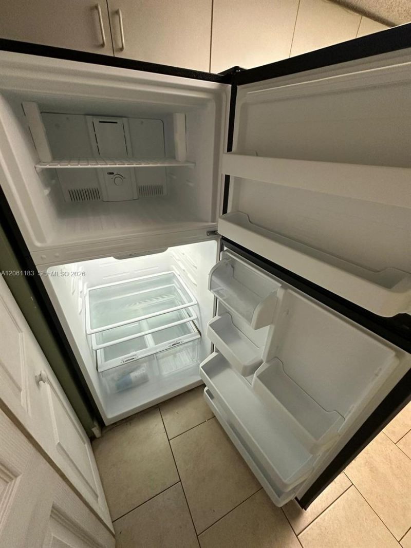 5005 Wiles Rd , Unit 102, Coconut Creek, FL 33073 Photo