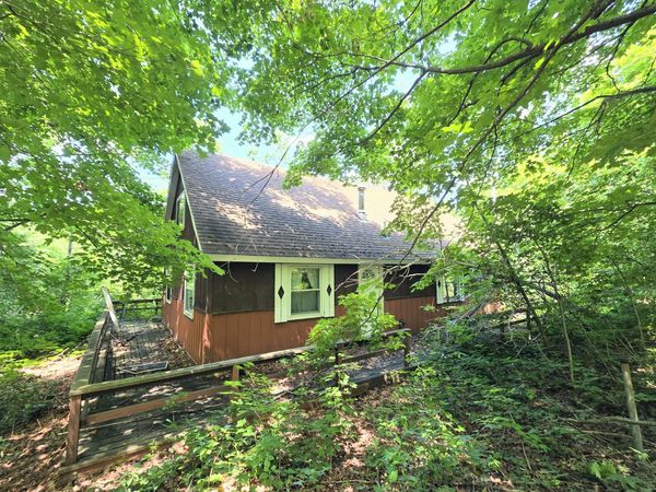 6599 Westlake Drive, Elmira, MI 49730