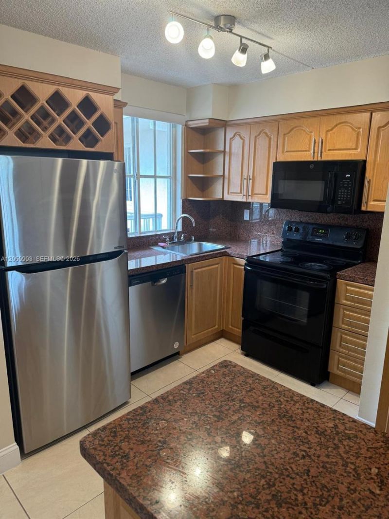 6045 NW 186th St , Unit 309, Hialeah, FL 33015 Photo