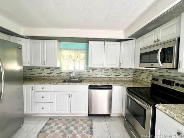 4169 70th Lane N, Unit 1047, West Palm Beach, FL 33404 Photo
