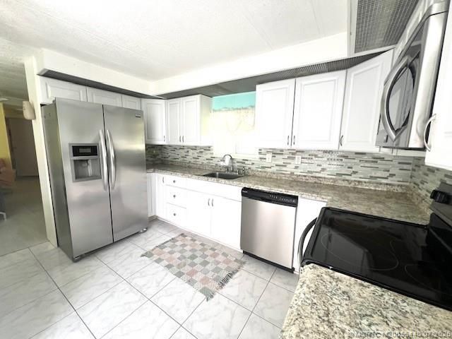 4169 70th Lane N, Unit 1047, West Palm Beach, FL 33404 Photo