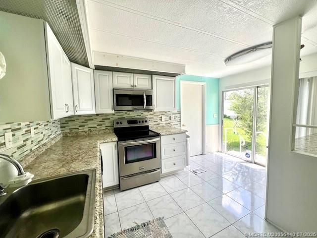 4169 70th Lane N, Unit 1047, West Palm Beach, FL 33404 Photo