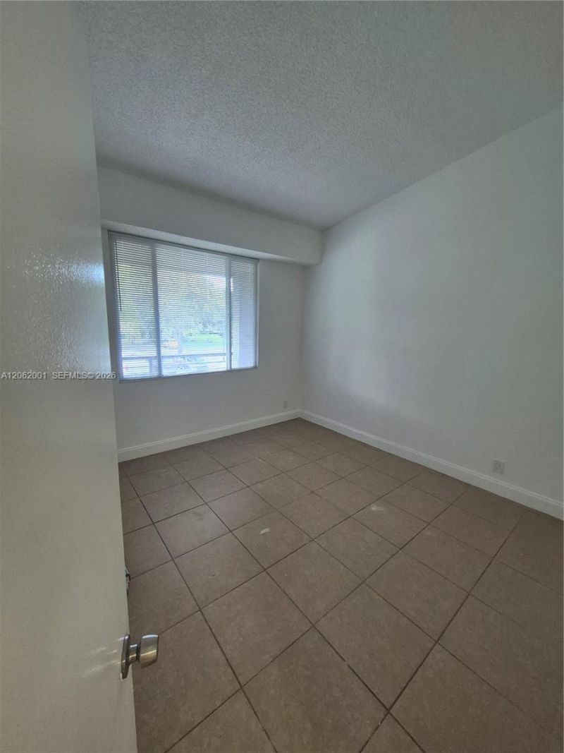 831 Lyons Rd , Unit 23203, Coconut Creek, FL 33063 Photo