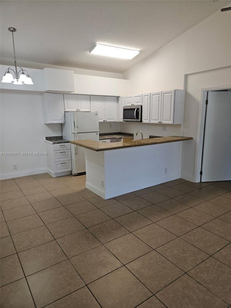 831 Lyons Rd , Unit 23203, Coconut Creek, FL 33063 Photo