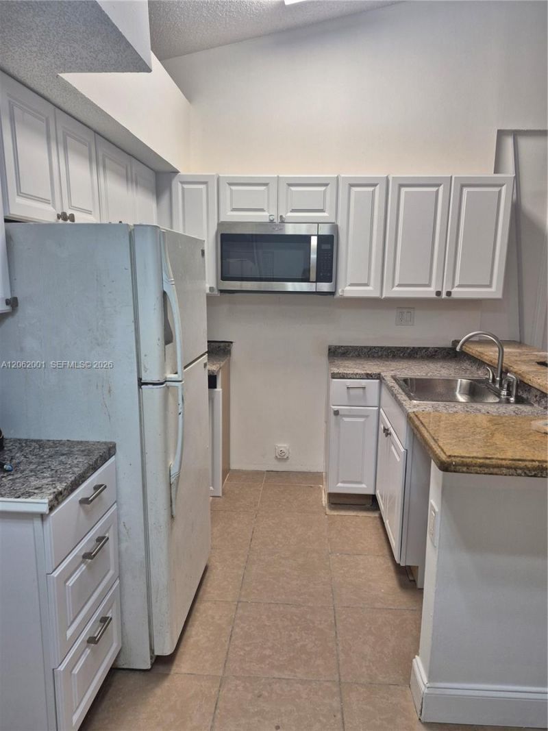 831 Lyons Rd , Unit 23203, Coconut Creek, FL 33063 Photo