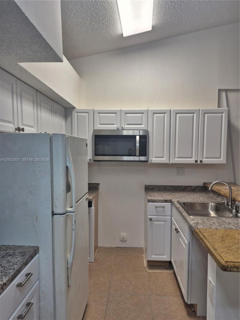 831 Lyons Rd , Unit 23203, Coconut Creek, FL 33063 Photo