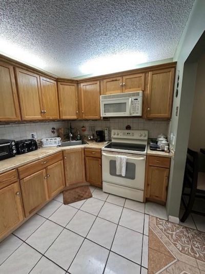 325 Knotty Pine Circle, Unit A-1, Greenacres, FL 33463 Photo
