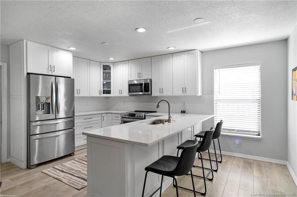 1614 SW Seagull Way, Palm City, FL 34990 Photo