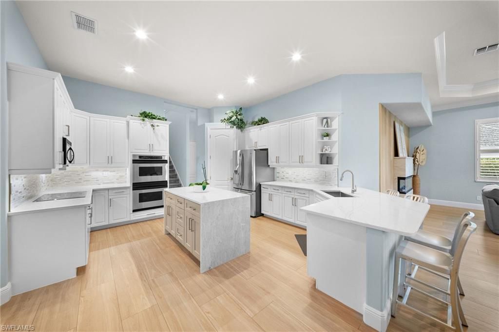 9069 The Lane, Naples, FL 34109 Photo