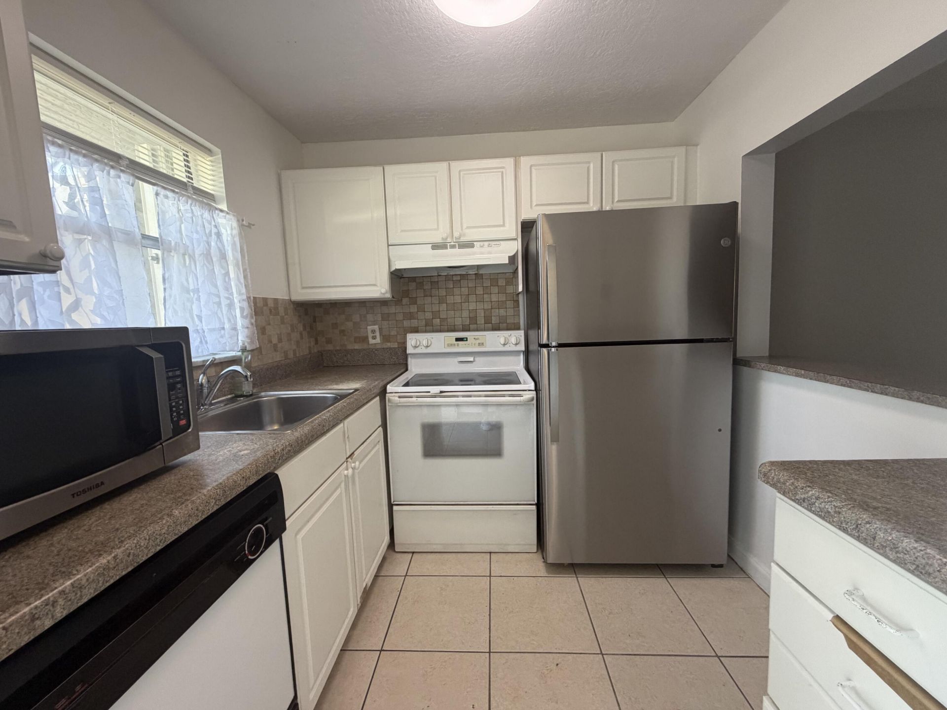 9915 Sandalfoot Boulevard, Unit 410, Boca Raton, FL 33428 Photo