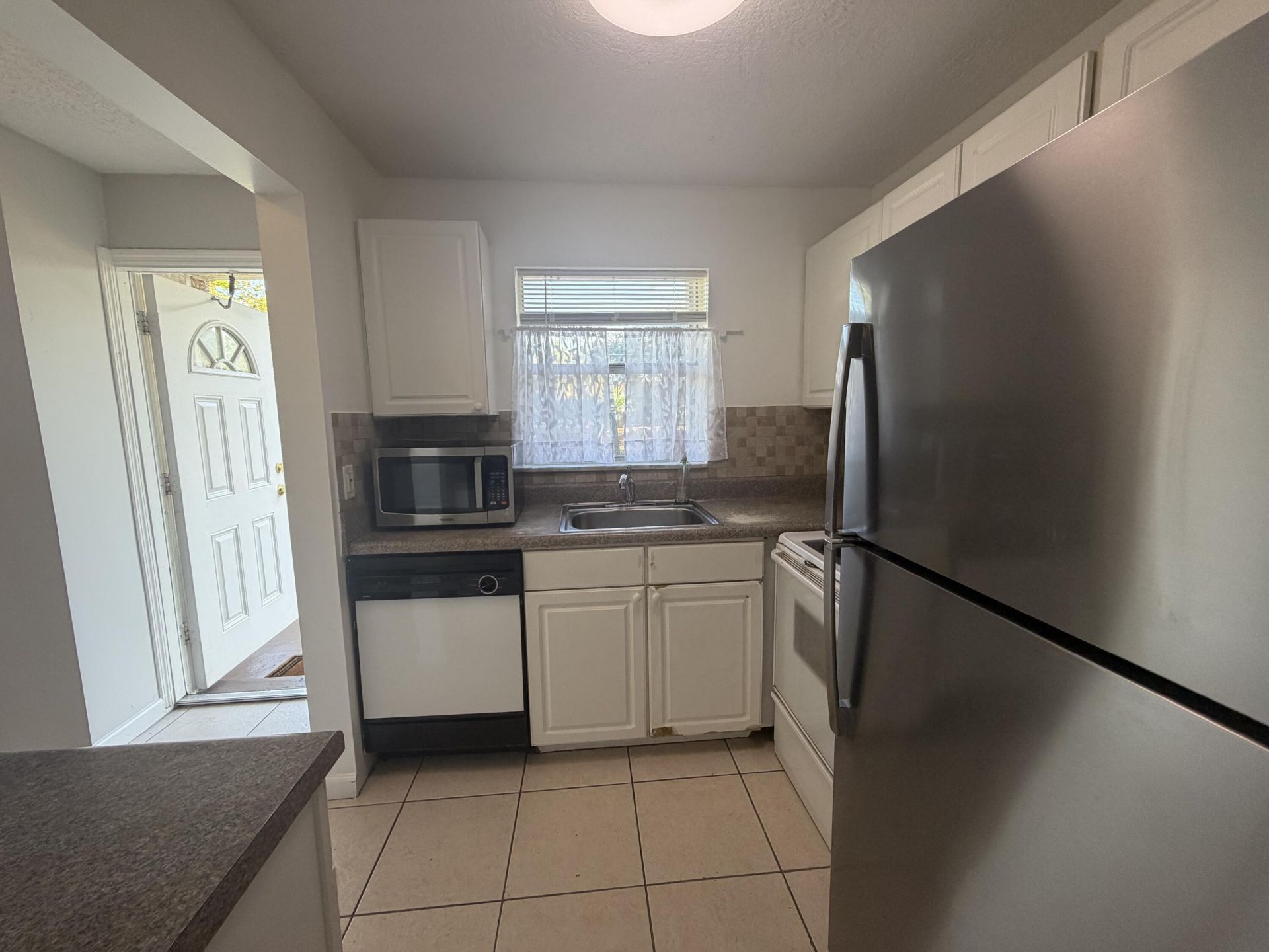 9915 Sandalfoot Boulevard, Unit 410, Boca Raton, FL 33428 Photo