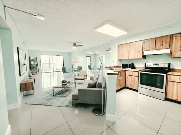 2112 S CYPRESS BEND Drive, Unit 707, Pompano Beach, FL 33069